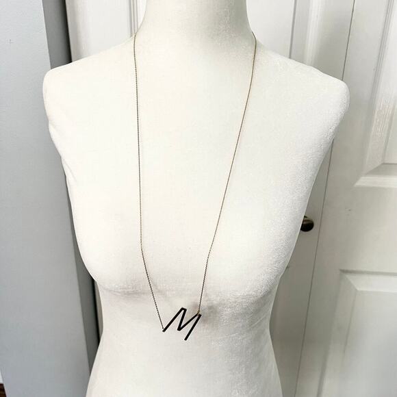 Long M Initial Necklace on a Gold Tone Chain - Picture 1 of 5
